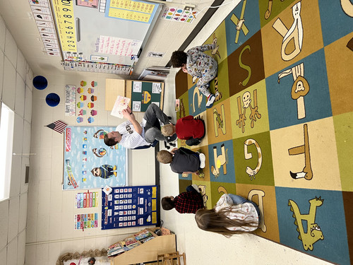 Mr. Haglund reads to the Pre-Kindergarten class!